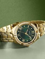 Product: GW0033L8 Dial Finish: Sunray Case Material: Stainless Steel Band Color: Gold Tone Buckle/Clasp: Pilot Buckle Case Color: Gold Tone Case Size: 36mm Dial Color: Green Watch Movement: Analog